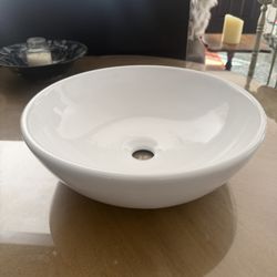 Round white vessel sink by Allen + Roth 