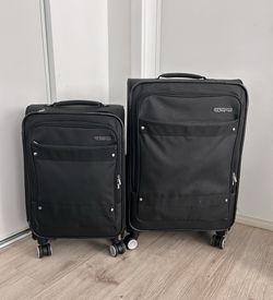 Like new condition American Tourister Whim Softside Expandable Luggage 2PC SET