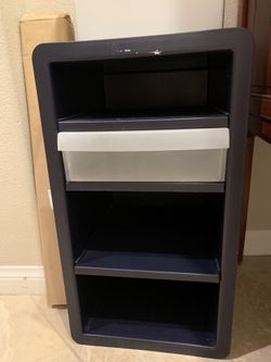Black plastic shelf