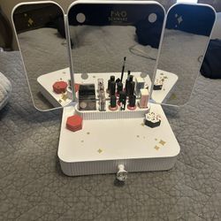 Vanity with light up mirror