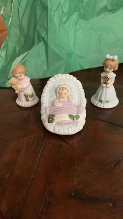 Enesco Growing Up Girls Porcelain Figurines - infant to 16 years old. 17 figurines in total.