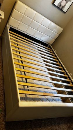 Full size bed frame and mattress with twin size pullout