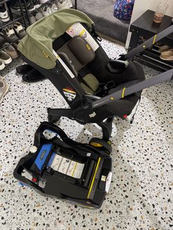 Doona car seat stroller with base