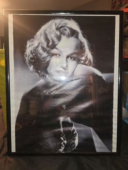 black-and-white portrait print of the iconic American actress and model Getty Images Marilyn Monroe, featuring her with classic 1950s wavy hair and re