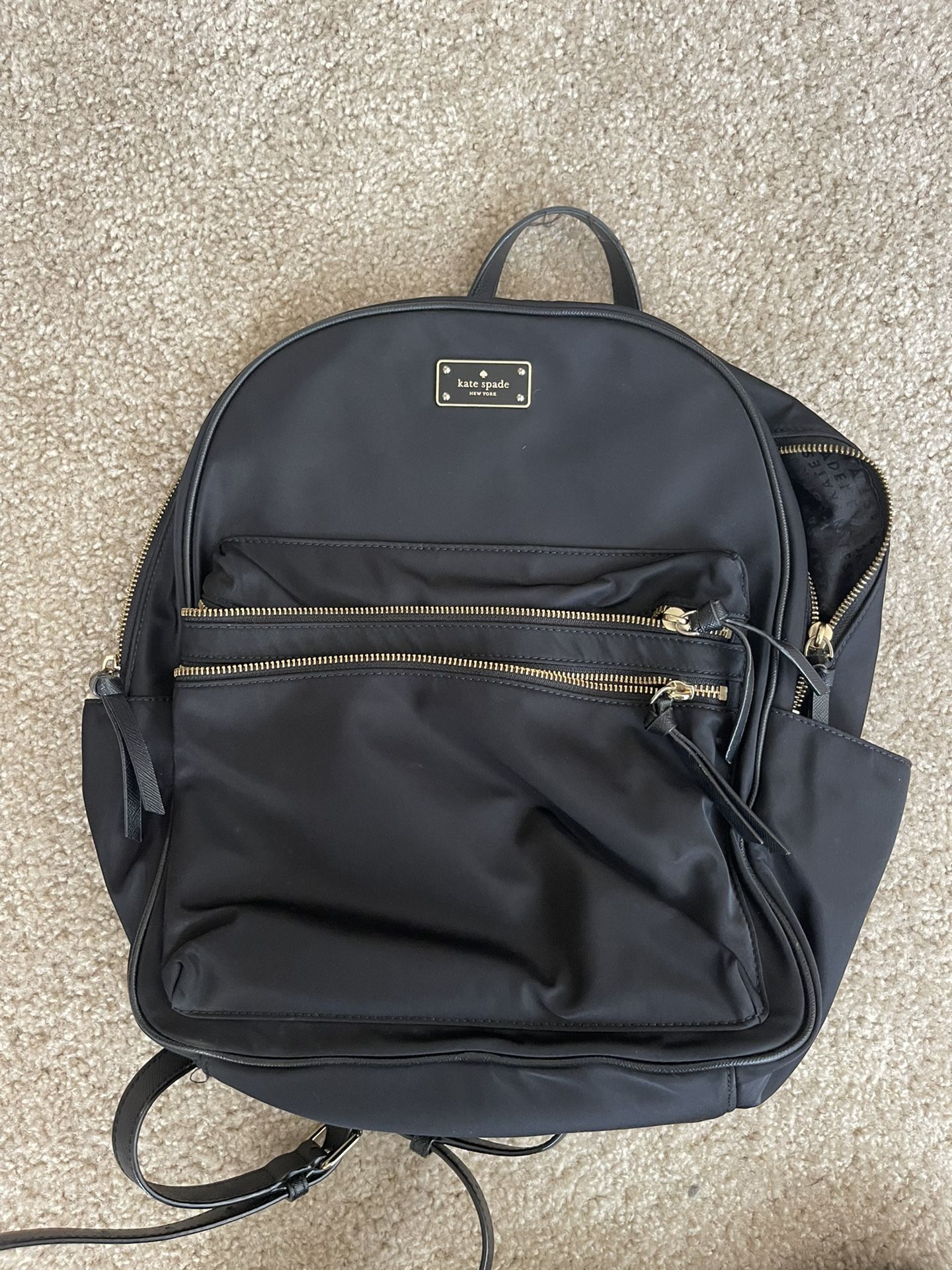 medium sized kate spade backpack 