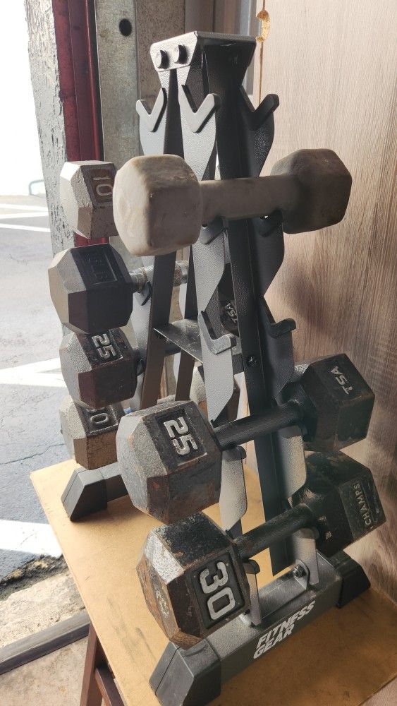 $120 Rack + Set Dumbells.