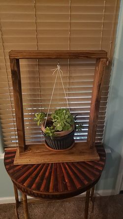 Hand made stand with succulents