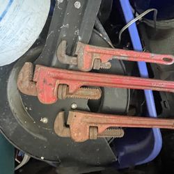 Three pipe wrenches