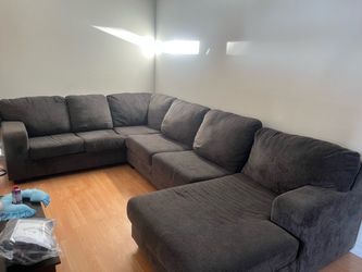 L sectional couch. Does not include pillows.