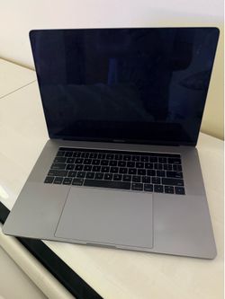 MacBook Pro 15” Touch Bar i7 • 16GB • 500GB SSD • Parts or Repair