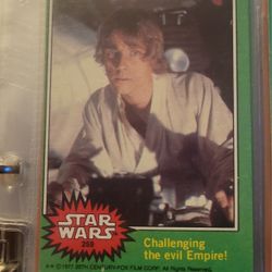1977 Topps Star Wars #259 Challenging The Evil Empire! card