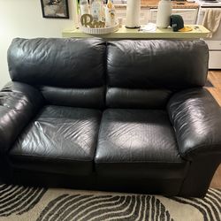Black leather 2 seater couch