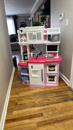 Pink toddler kitchen with accessories