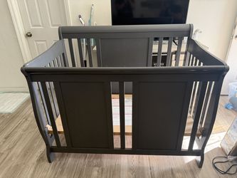 Gray convertible crib