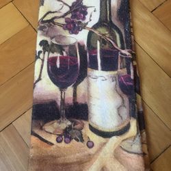 Brand new dish towel with wine bottle and wine glasses