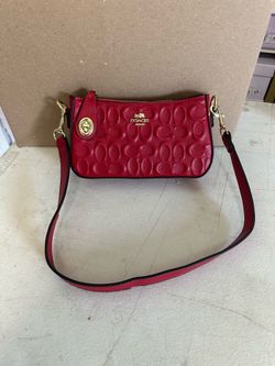 Purses red couch with straps