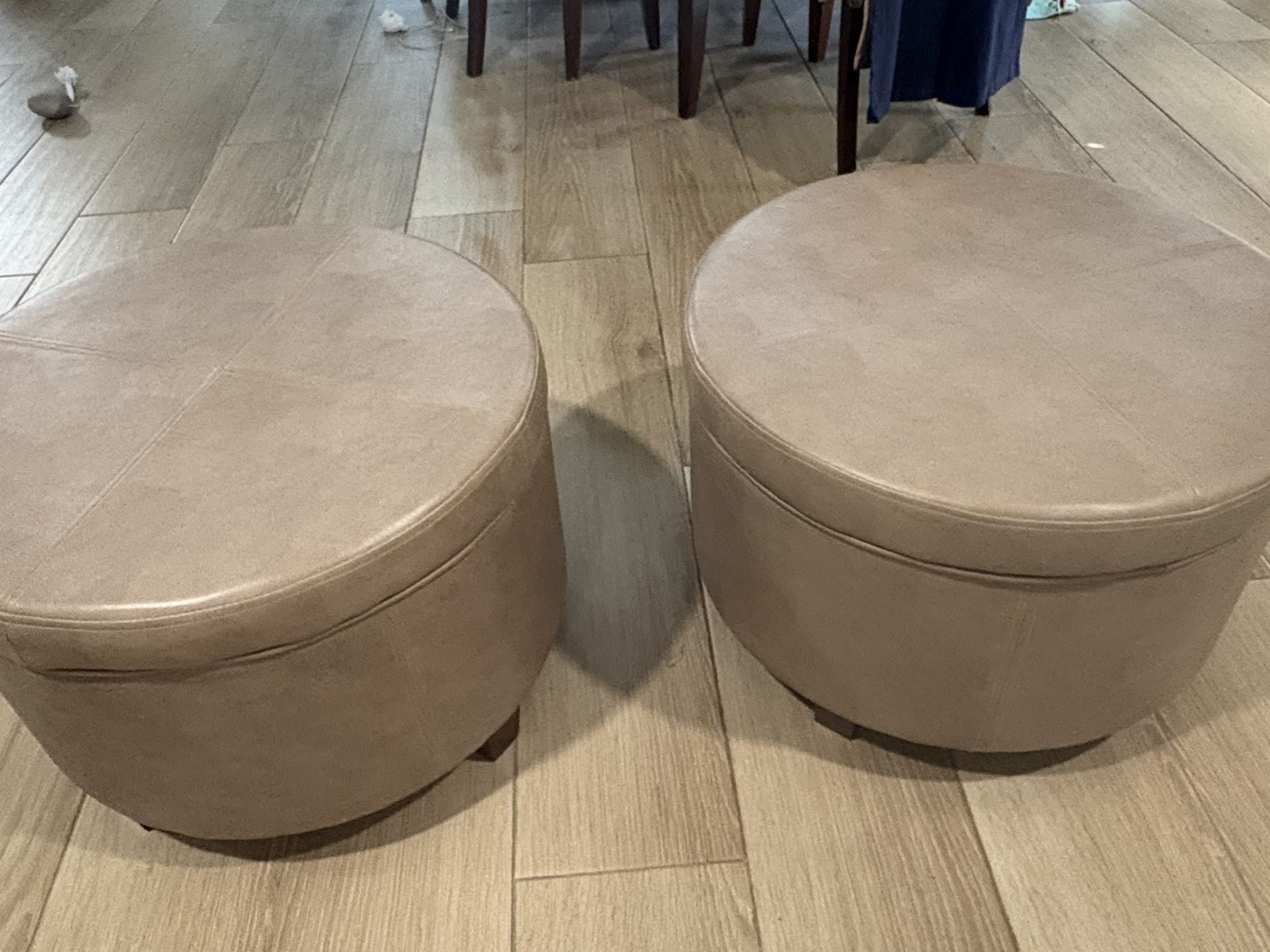 Two Round Ottomans 