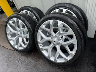 NEW 24 silver brushed snowflakes wrapped in Arturo az810 tires.