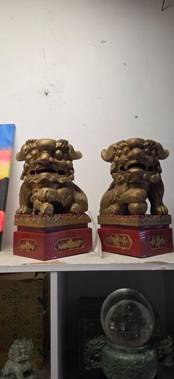 Antique foo dogs hand carved
