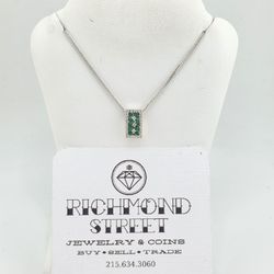 14k white gold 18" chain with diamond and emerald pendant