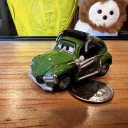 DISNEY PIXAR CARS - DIECAST CRUZ BESOURO WITH HEADPHONES - GREEN LIKE NEW
