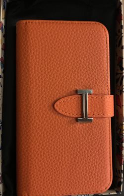 Orange iPhone X leather case. Very hip! BNEW