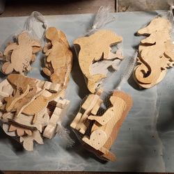 A Large Variety Of Wood Cutouts Hand Carved of Animals And Misc.