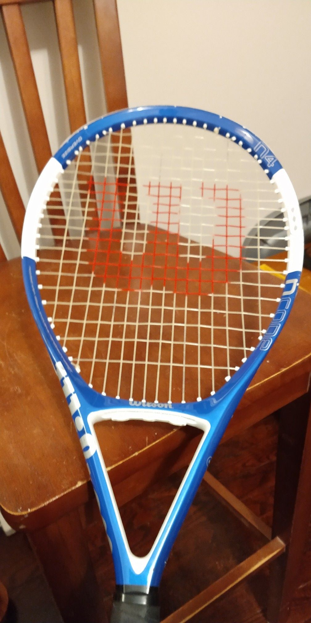 Wilson ncode oversized in for pro racket 4 3/8 record face is 14 and 1/2 in tall 11 in wide