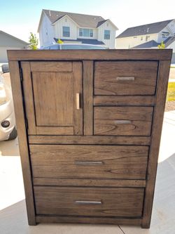 Three-piece bedroom furniture set- two nightstands and a chest