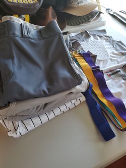Multiple baseball pants, belts, sliders w/cup chest protector undershirt
