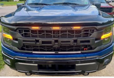 2025 Ford F-150 XLT Aftermarket RAPTOR Style Grille w/ Amber Lights and Camera Bracket