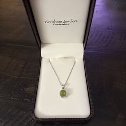 Green peridot necklace with diamond accents