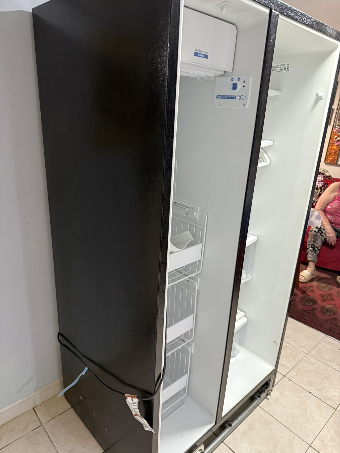 Whirlpool refrigerator 28 in depth 36 in wide 72 high with ice and water dispens