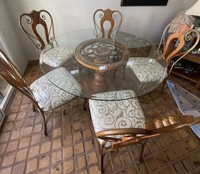 beautiful pedestal table with 54” beveled glass top and 5 chairs