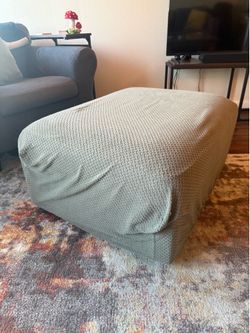 Storage ottoman, with olive green cover if wanted