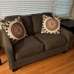 Brown Loveseat w/ Pillows - Ashley Furniture