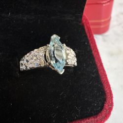 925 Sterling silver ,genuine Marquis cut blue topaz ring, tested in photos, marked Sterling KABANA , size 7