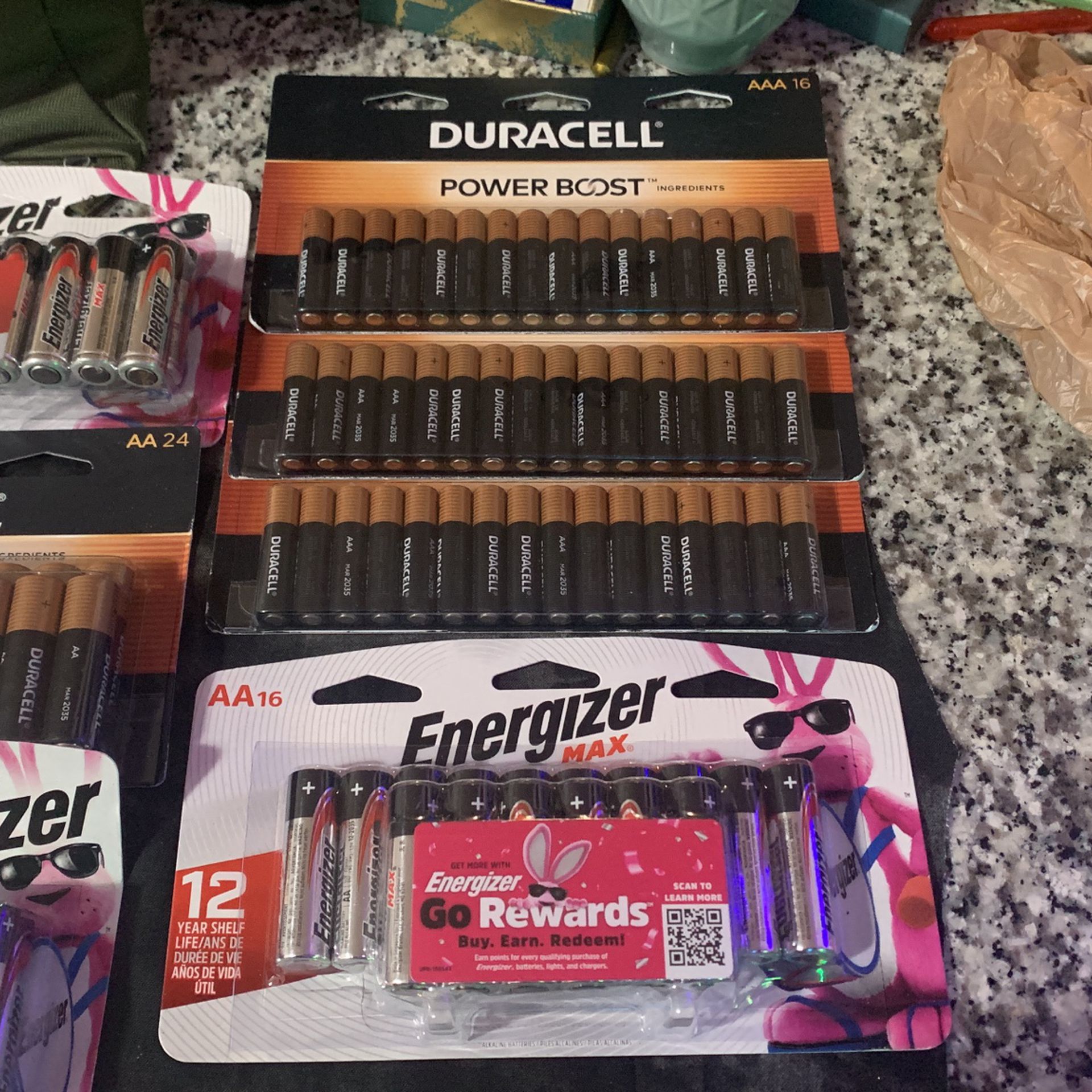 Three Packs Of Duracell 16 Packs, 1 Pack Of Energizer 16 Pack, 2 Packs Of 24 AA’s One Energizer And One Duracell And 2 Packs Of AA’s 8pack