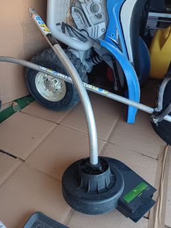 John Deere blower weed wacker attachment. 23 mile and Card Macomb Township Michigan