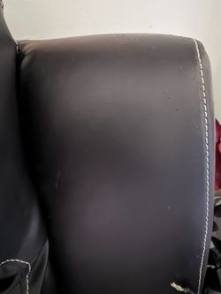 Black leather reclining sofa and loveseat