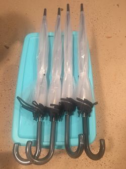 4 new umbrellas... bought for wedding photos , never used
