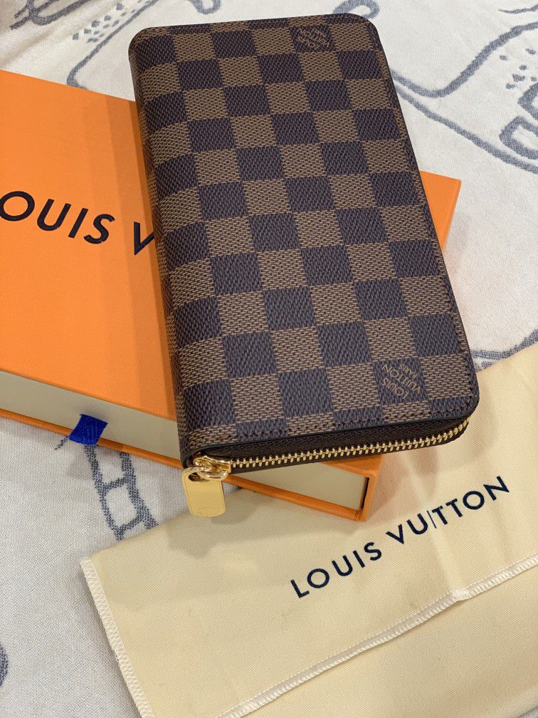 Bags  Sold Authentic Louis Vuitton Zippy Wallet Damier Ebene