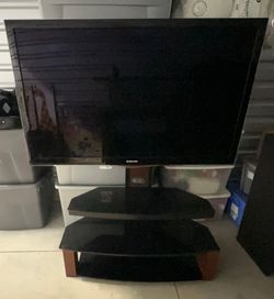 SAMSUNG 55 INCH FLAT SCREEN TV WITH AWESOME STAND