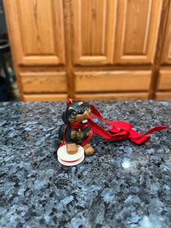 1995 Hallmark Puppy Love Christmas Ornament #5 Rottweiler Dog Red Ribbon.  Preowned Excellent Condition.  Smoke free home