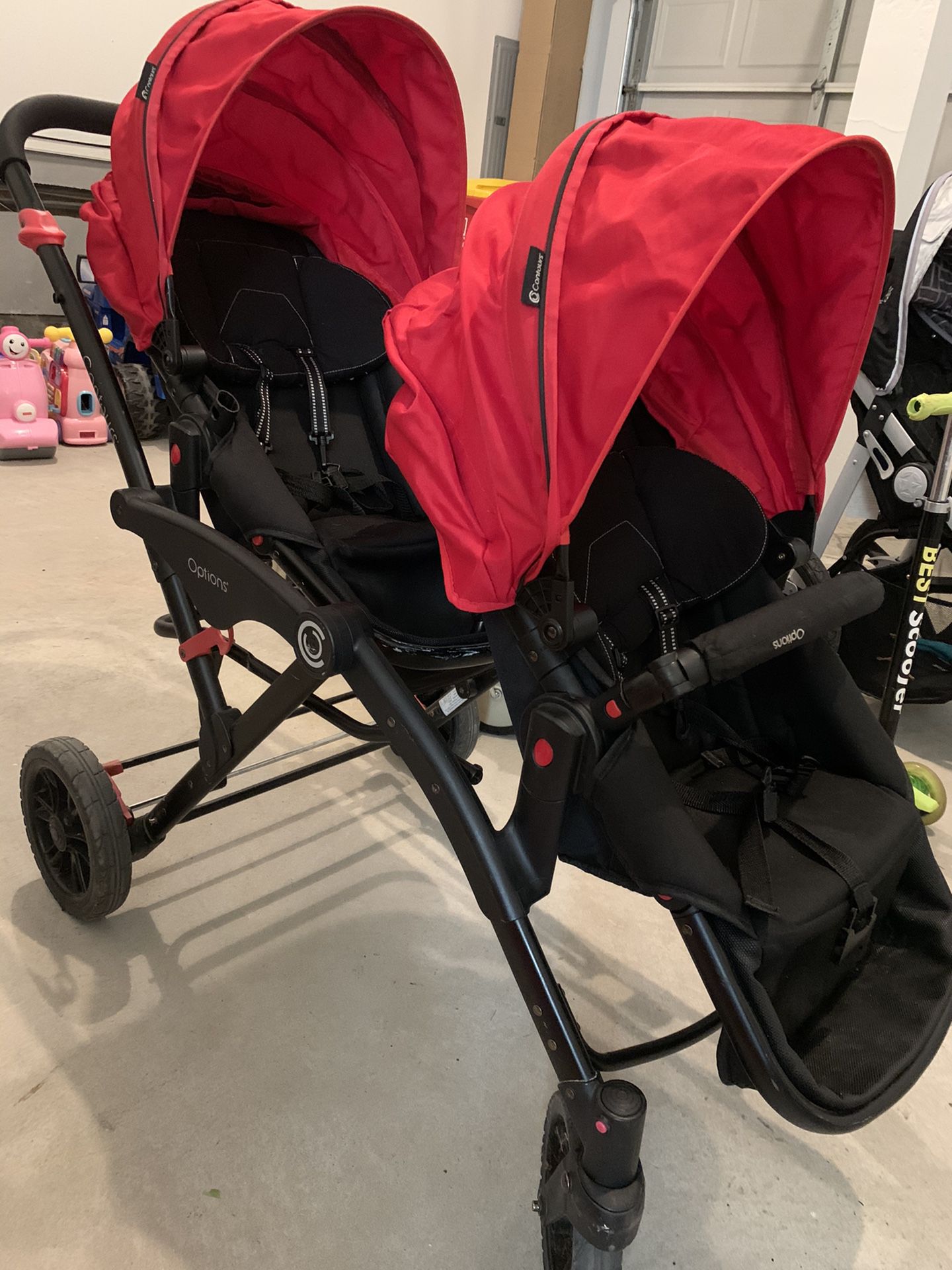 Double stroller with car seat attachment