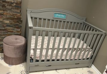 Gray Graco Baby Crib