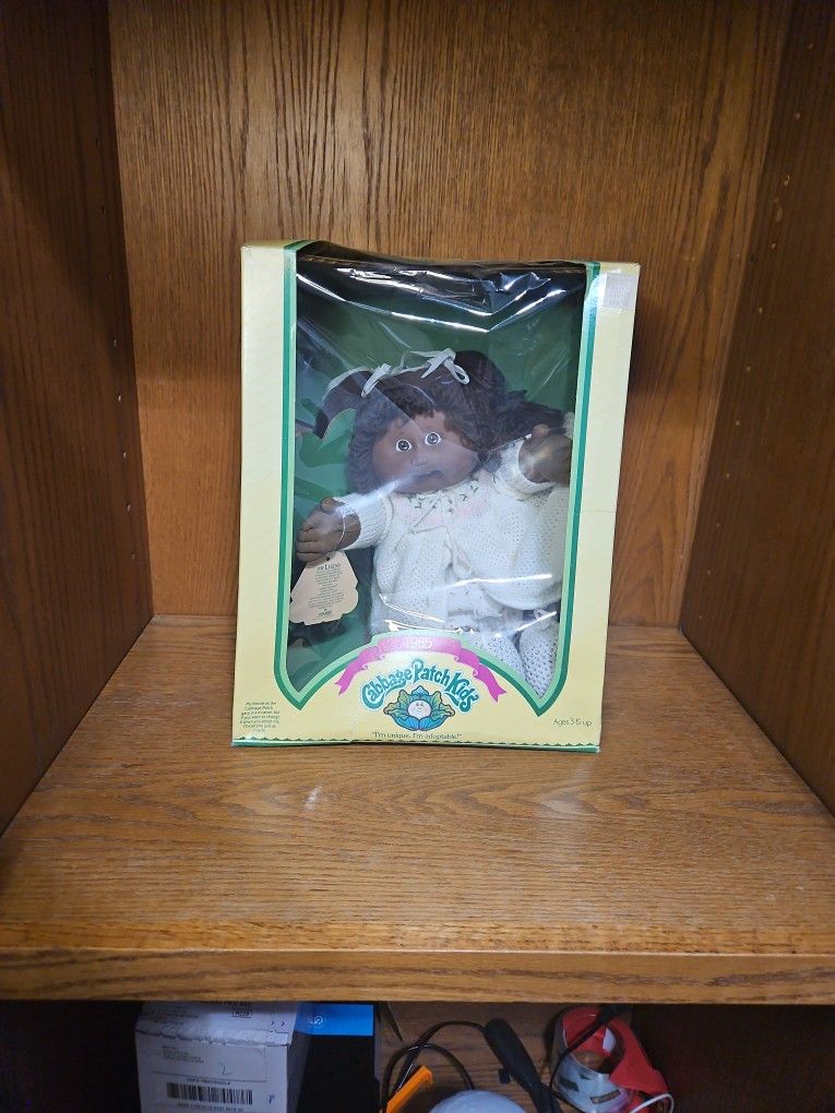 1985 Cabbage Patch Kids doll, specifically an African American version, still in its original packaging