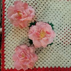 3 Fabric roses, 5 1/2 inches wide.