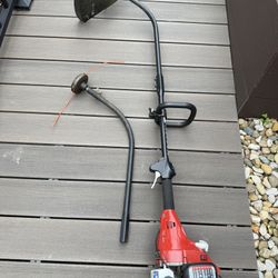 HomeLite Gas Powered Weed Wacker in great shape!  Comes with replacement head.  