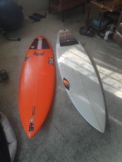 Orange board lost mini driver 5×11.18×3/4 2×7/16. With fins Disco 5×10. 19×1/2. 2×1/2
